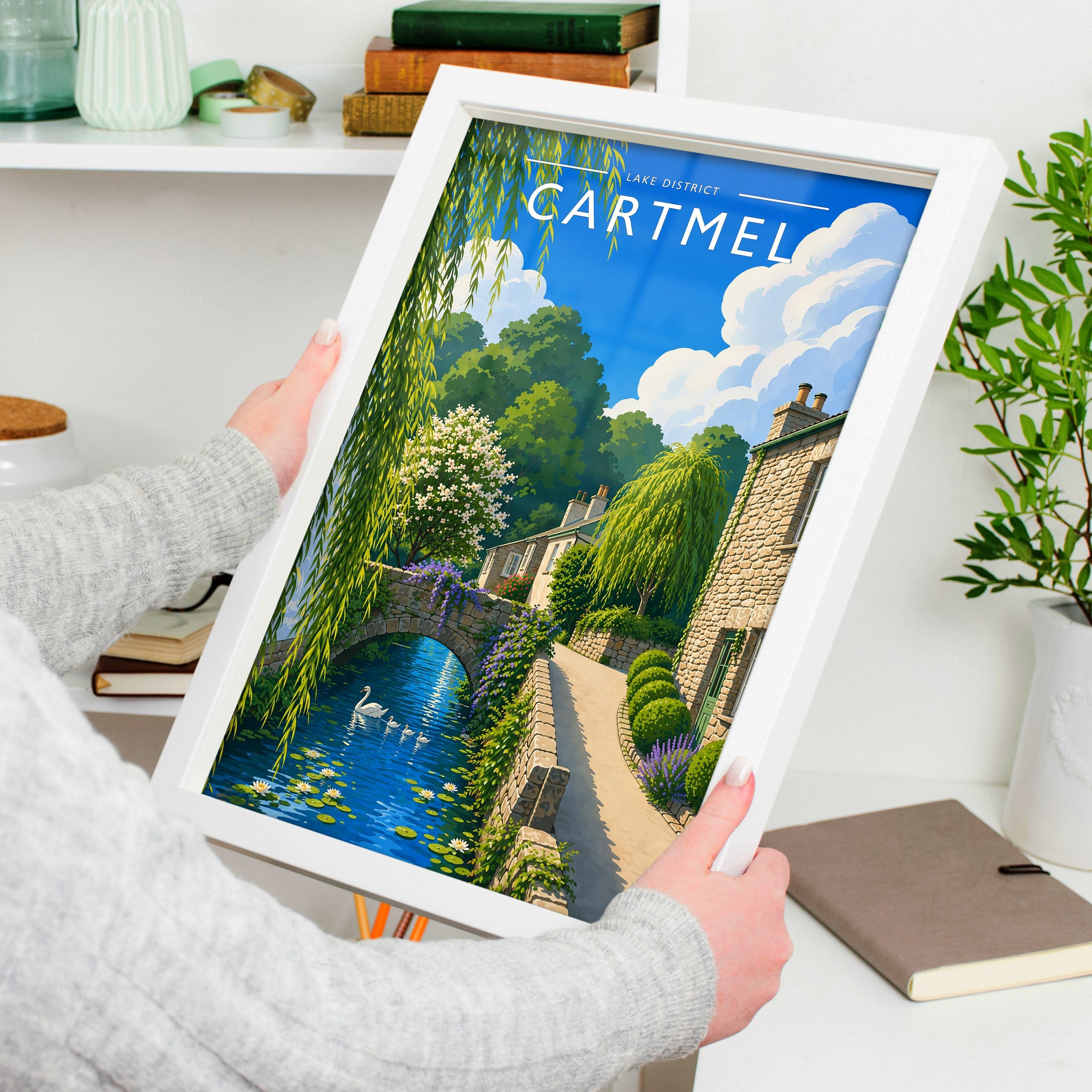 Cartmel Travel Poster in a white frame, held to show scale