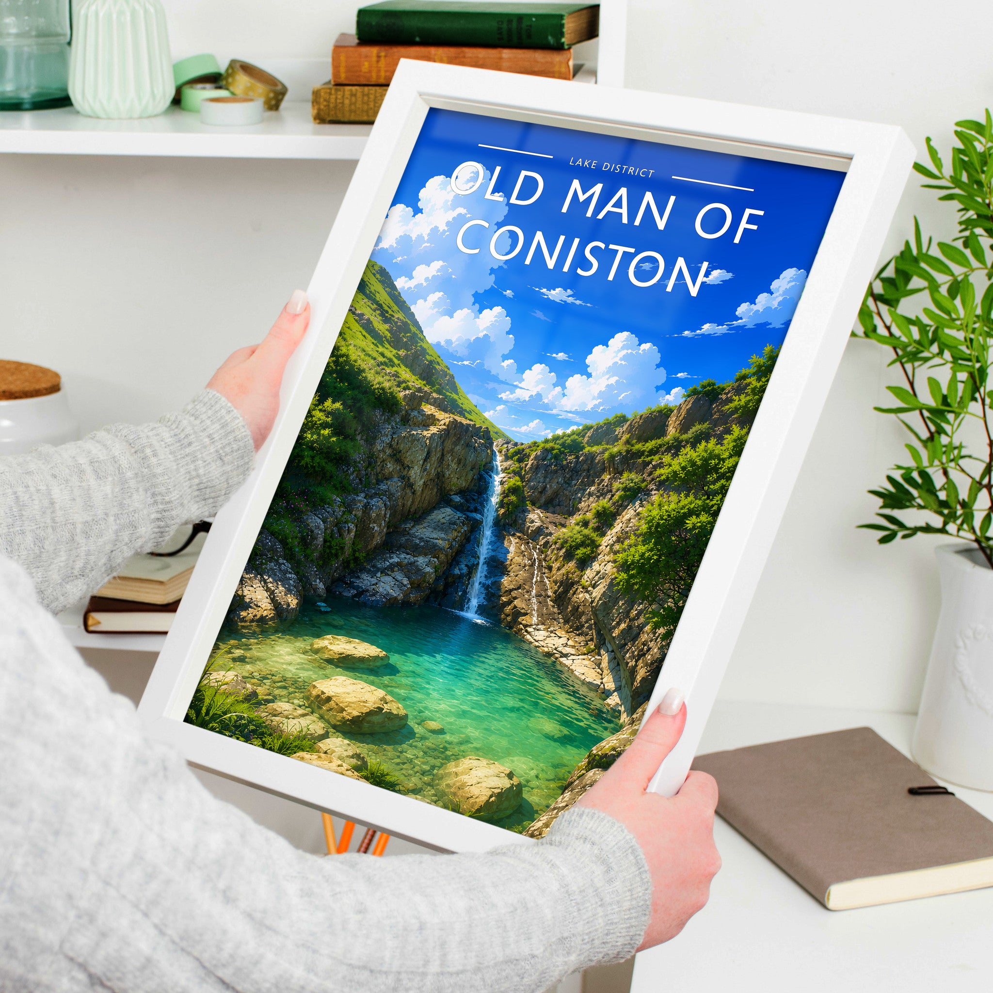 Old Man of Coniston Travel Poster in a white frame, held to show scale