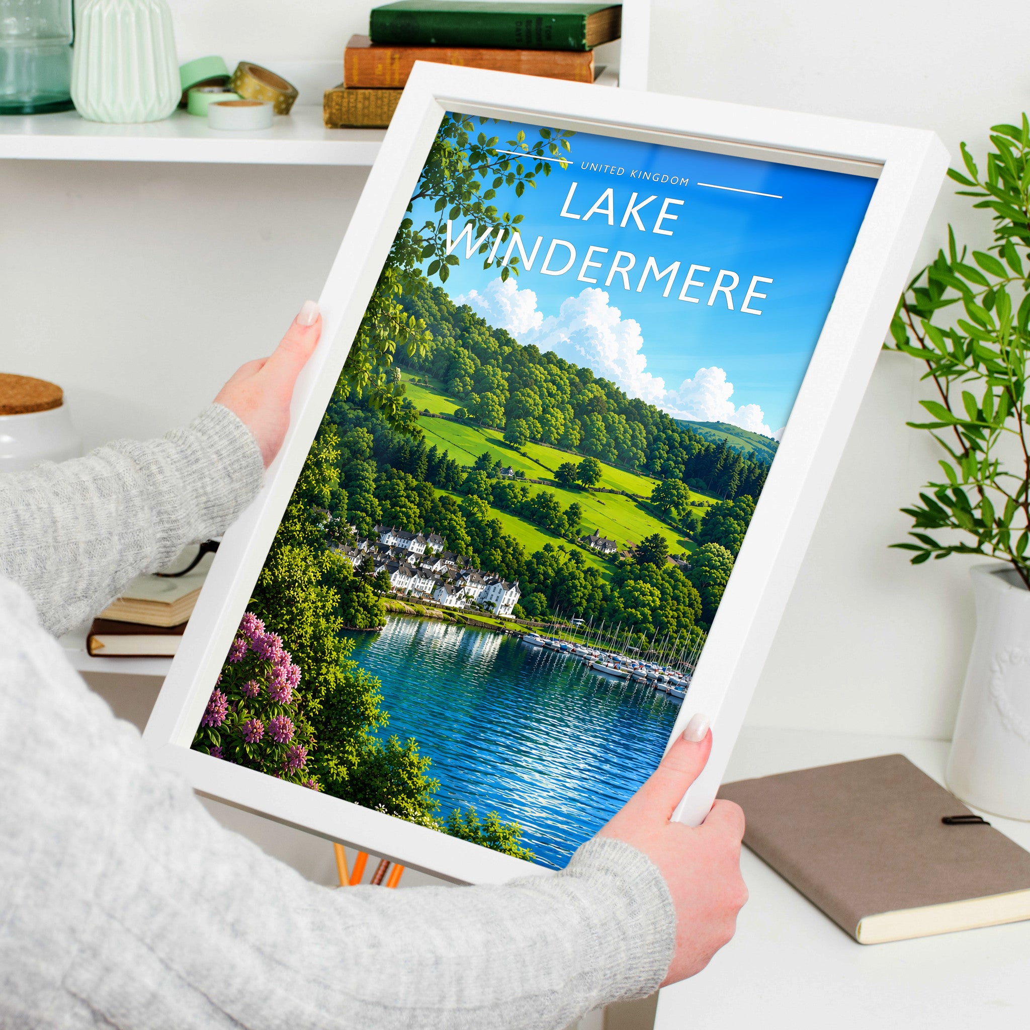 Lake Windermere Travel Poster in a white frame, held to show scale