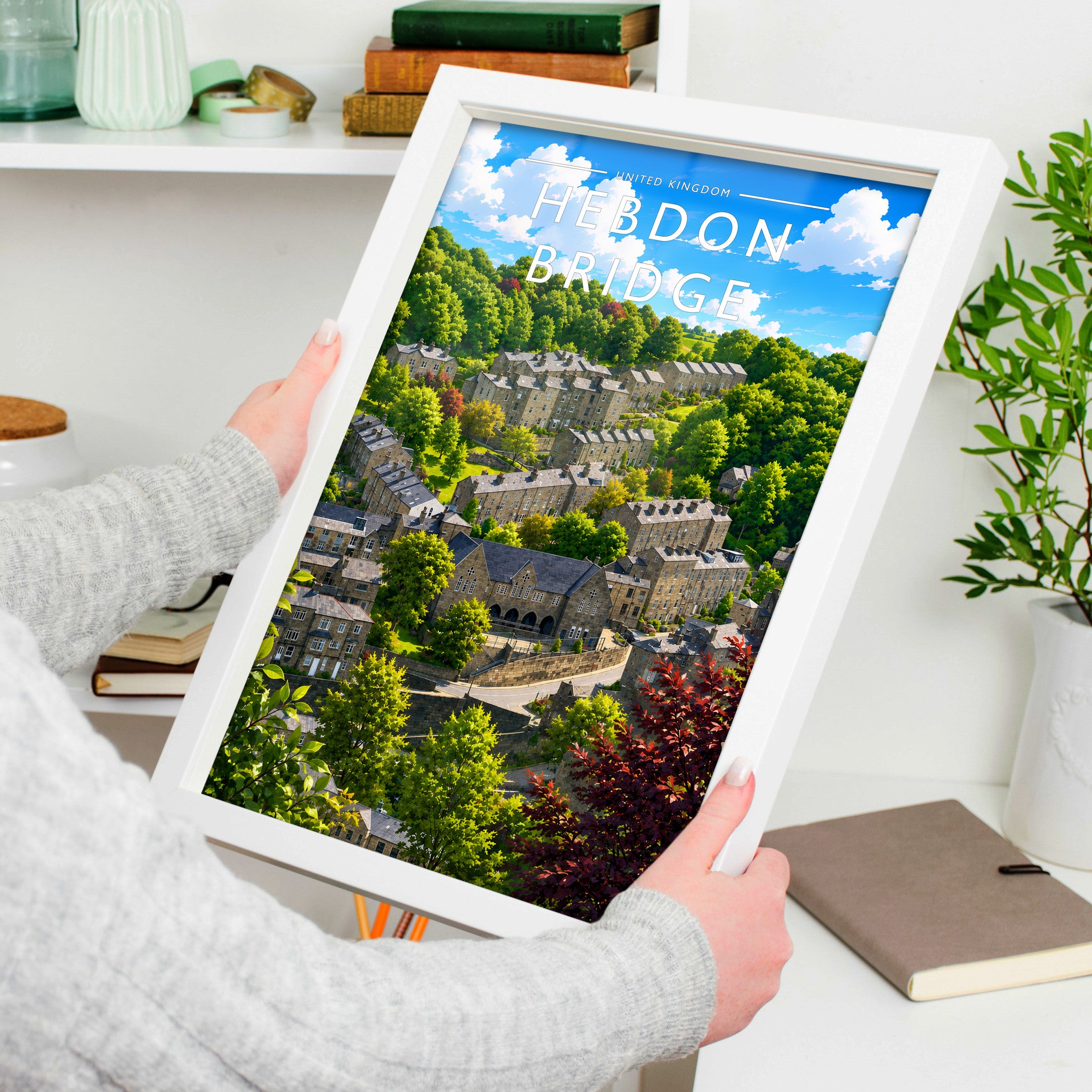 Hebden Bridge Travel Poster in a white frame, held to show scale