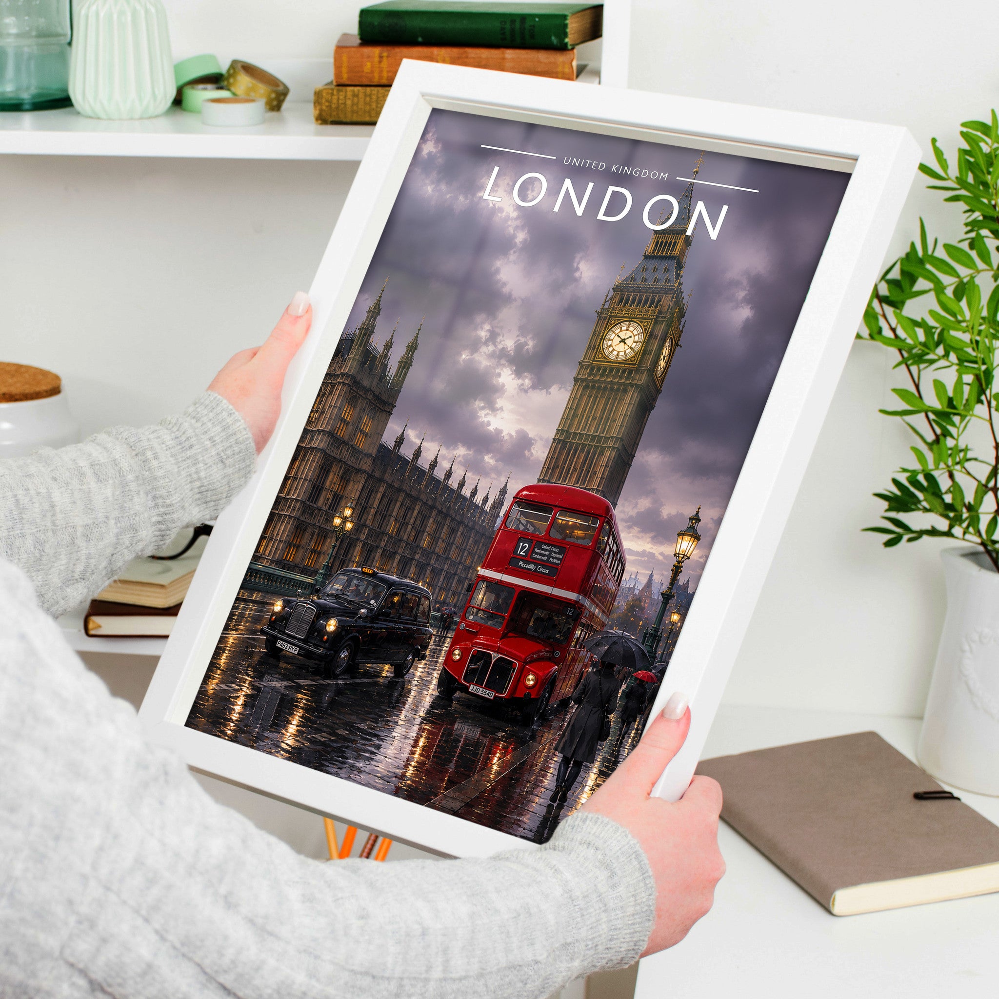 London #8 Travel Poster in a white frame, held to show scale