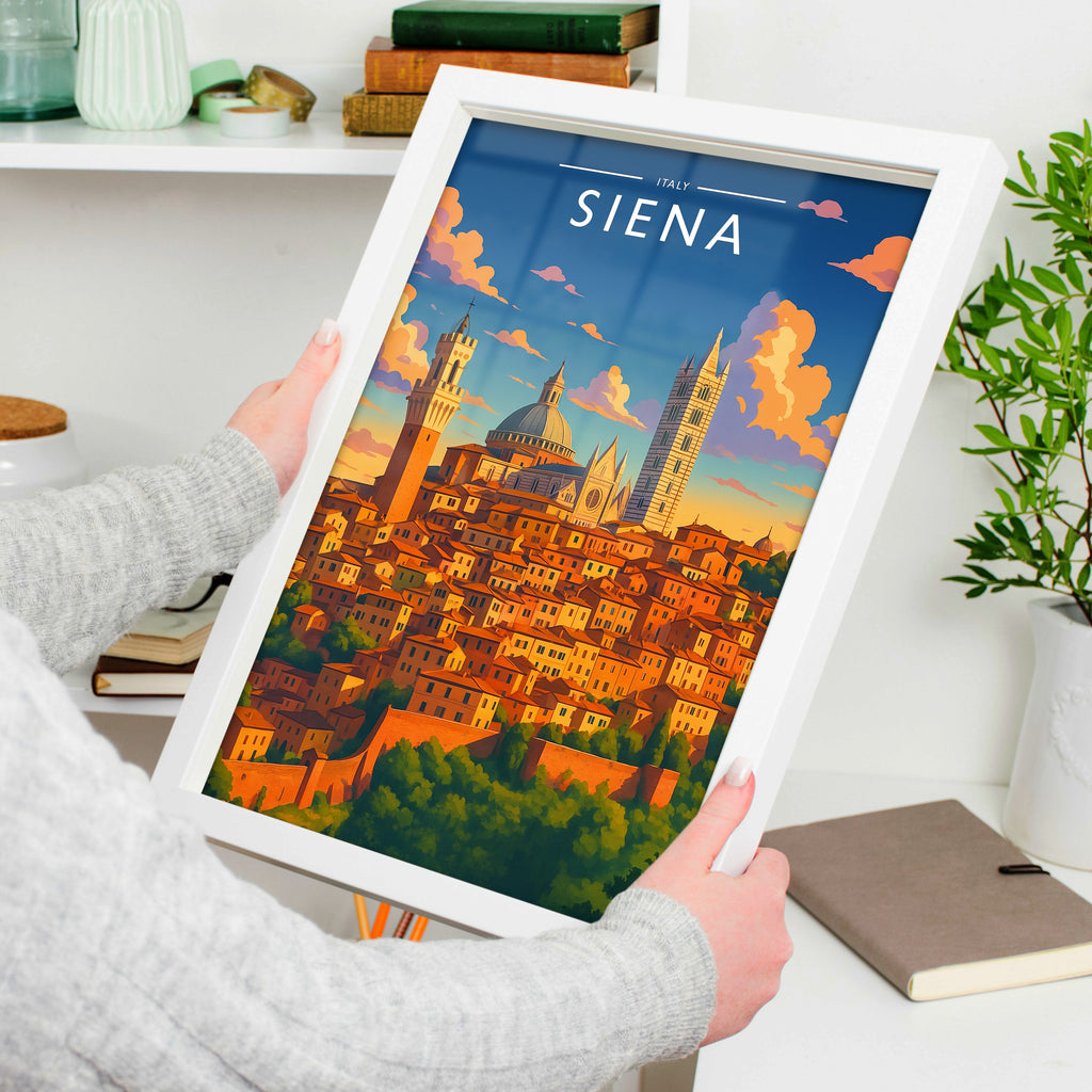 Siena Travel Poster in a white frame, held to show scale