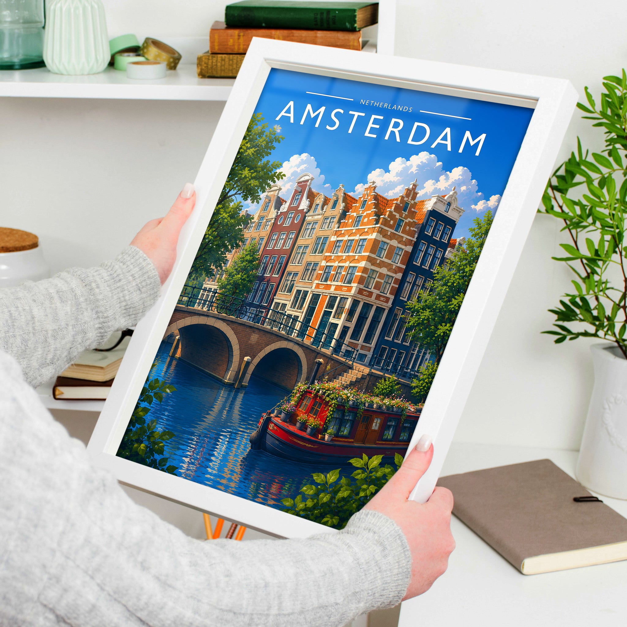 Amsterdam #4 Travel Poster in a white frame, held to show scale