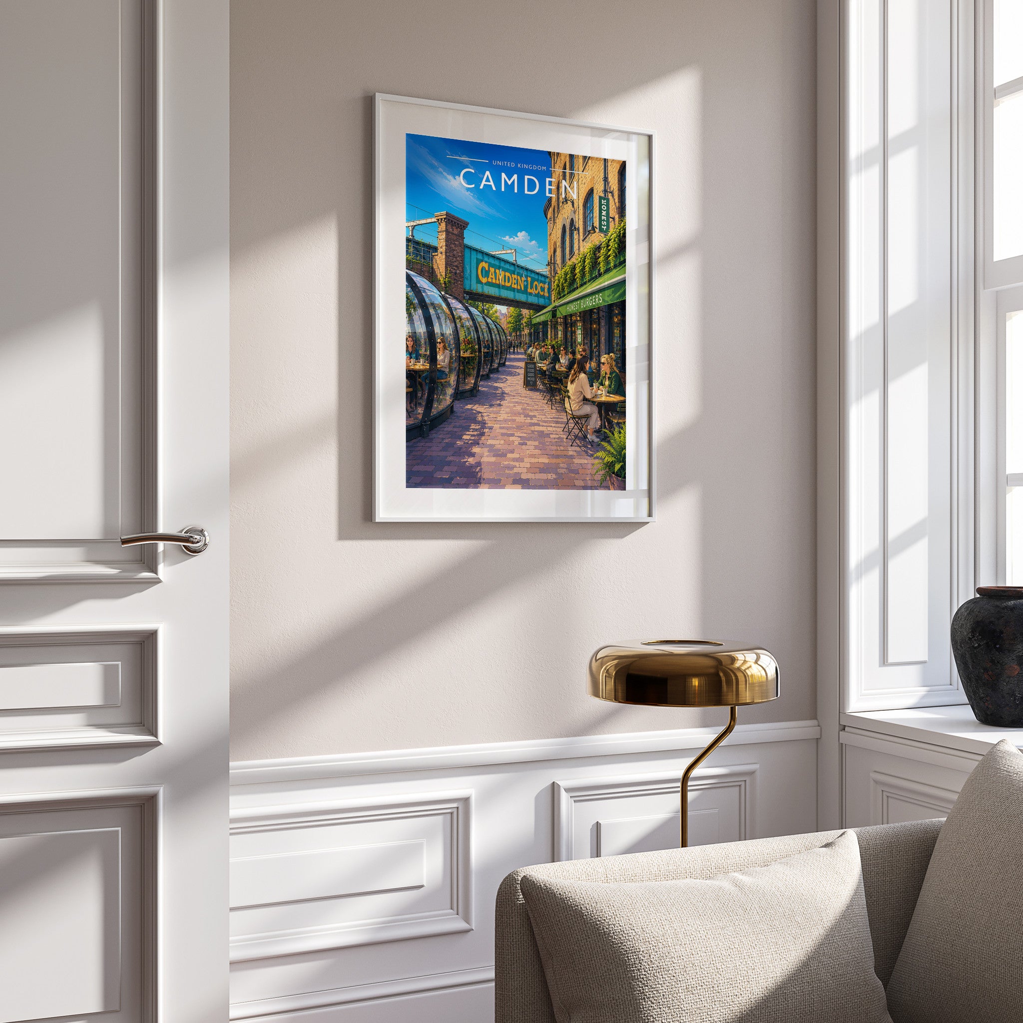 Camden Travel Poster in a white frame on a panelled wall