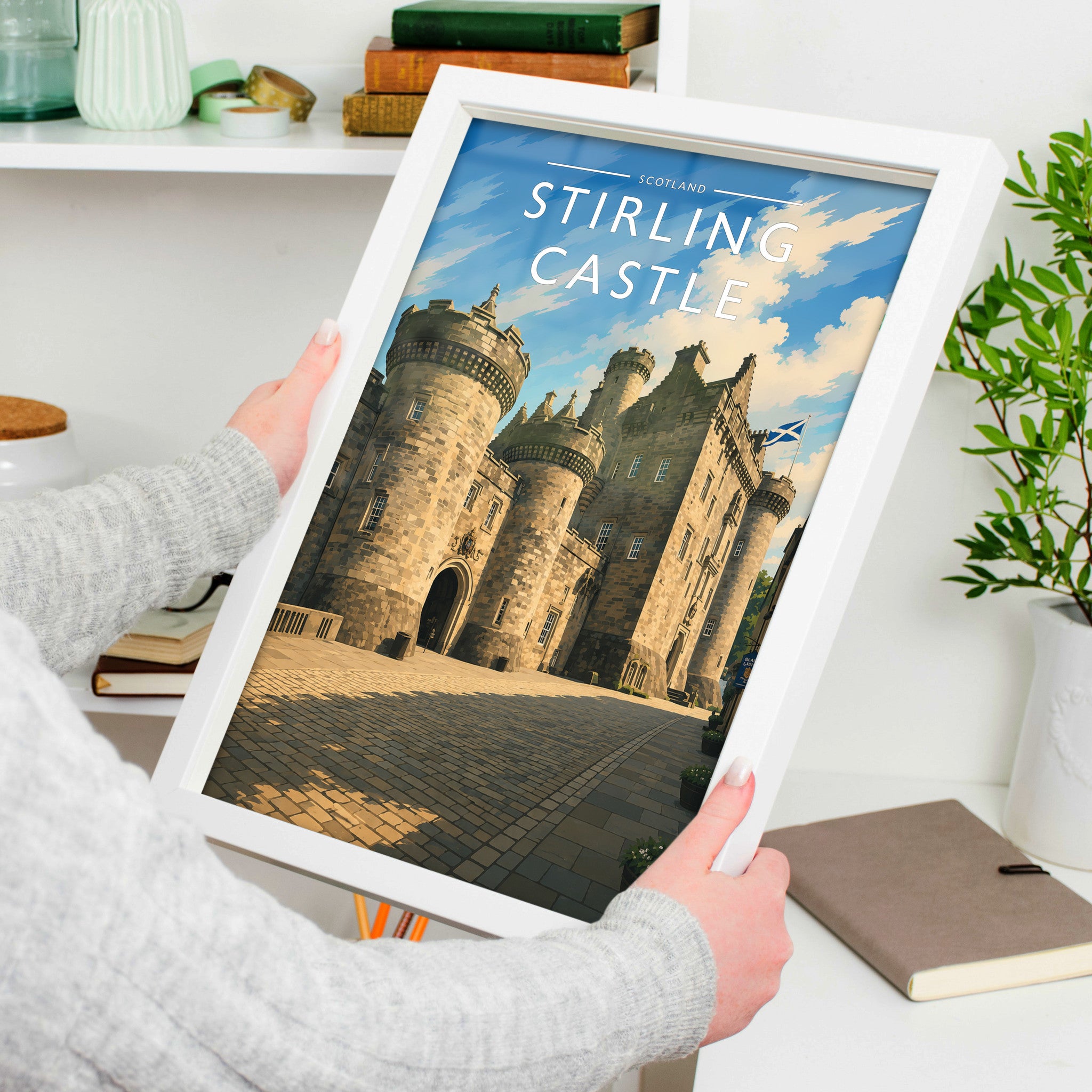 Stirling Castle Travel Poster in a white frame, held to show scale