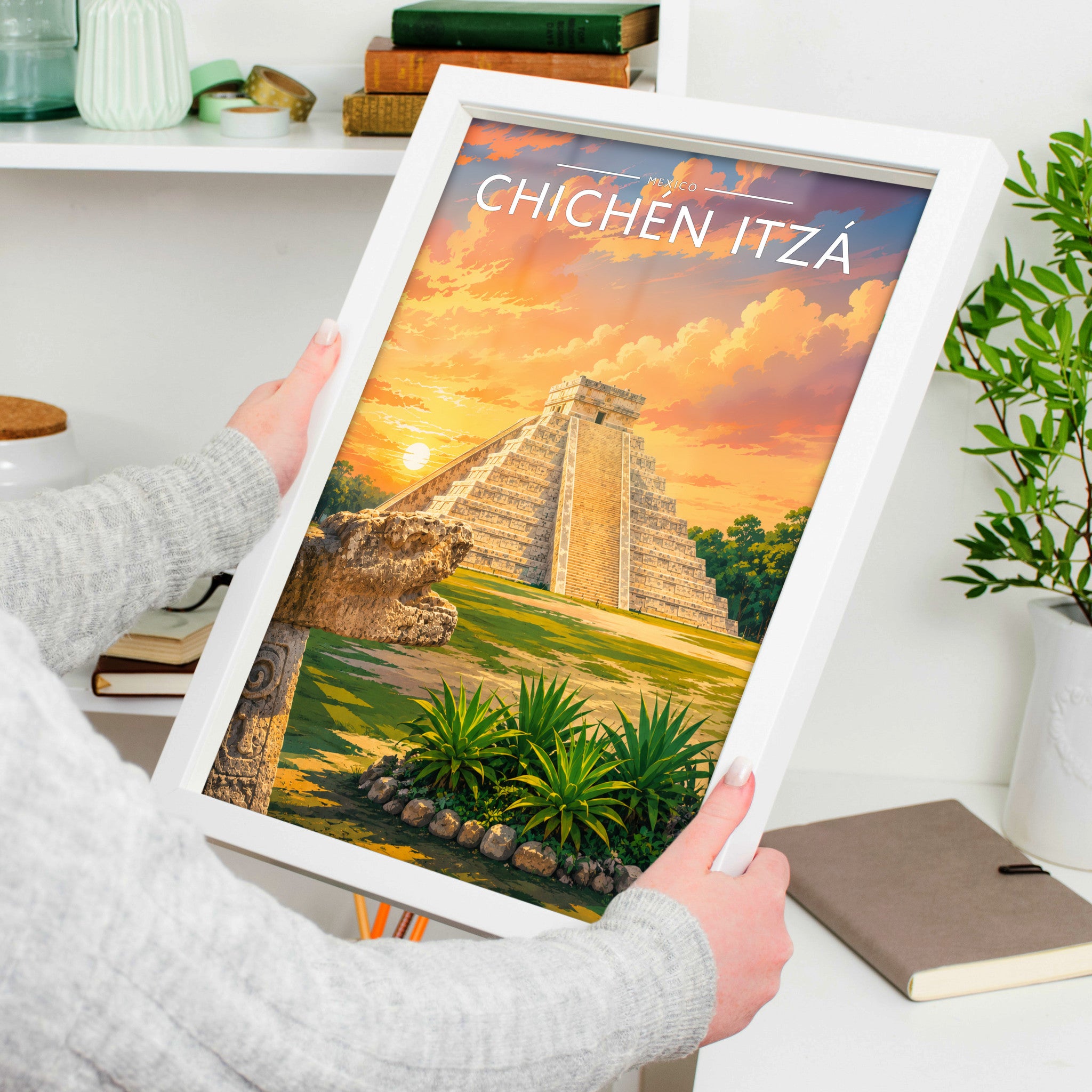 Chichén Itzá #2 Travel Poster in a white frame, held to show scale