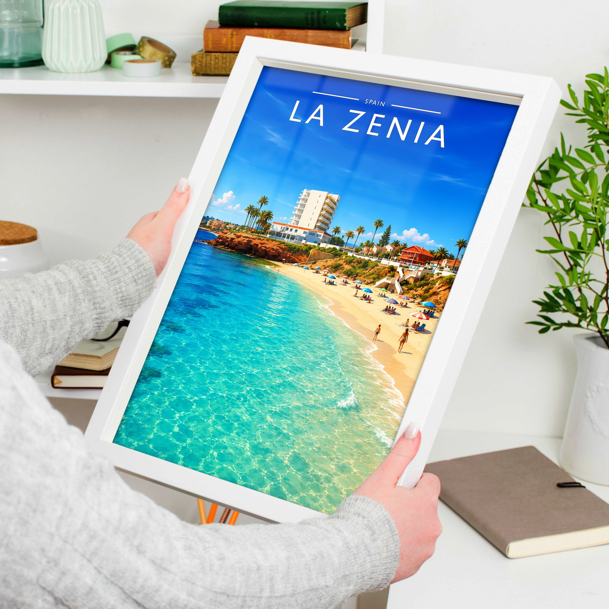 La Zenia Travel Poster in a white frame, held to show scale