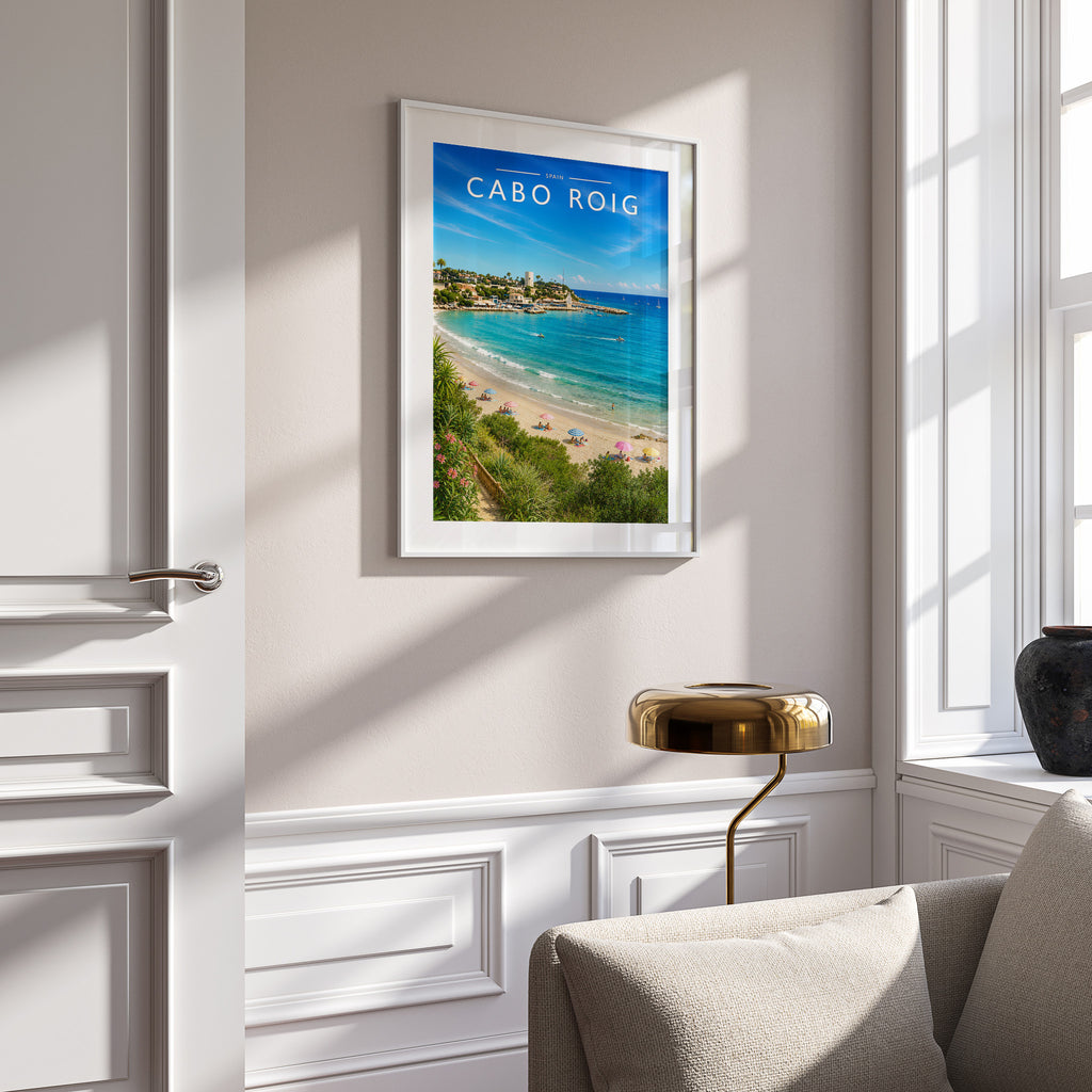 Cabo Roig Travel Poster in a white frame on a panelled wall