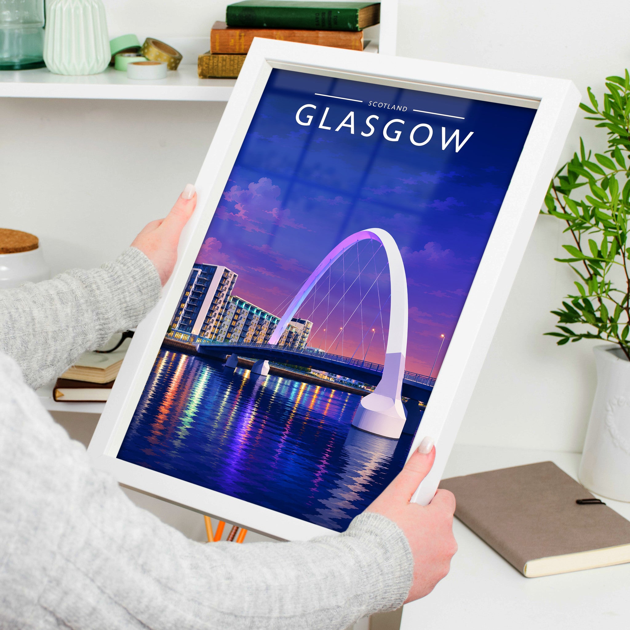 Glasgow #2 Travel Poster in a white frame, held to show scale