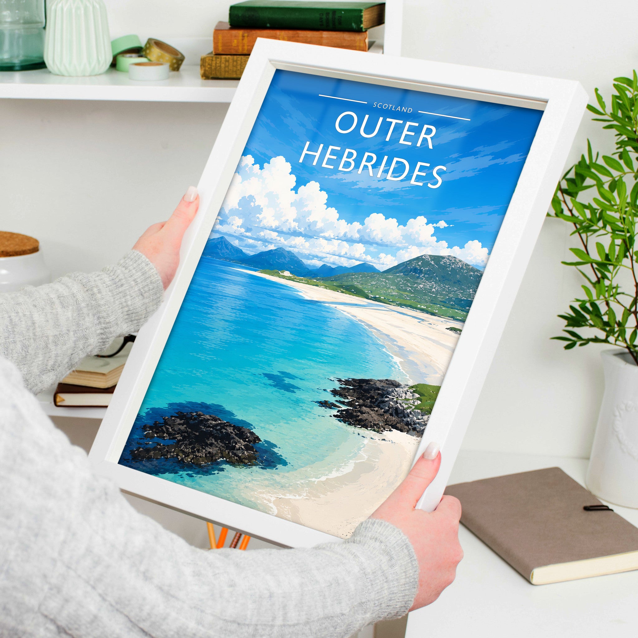 Outer Hebrides Travel Poster in a white frame, held to show scale