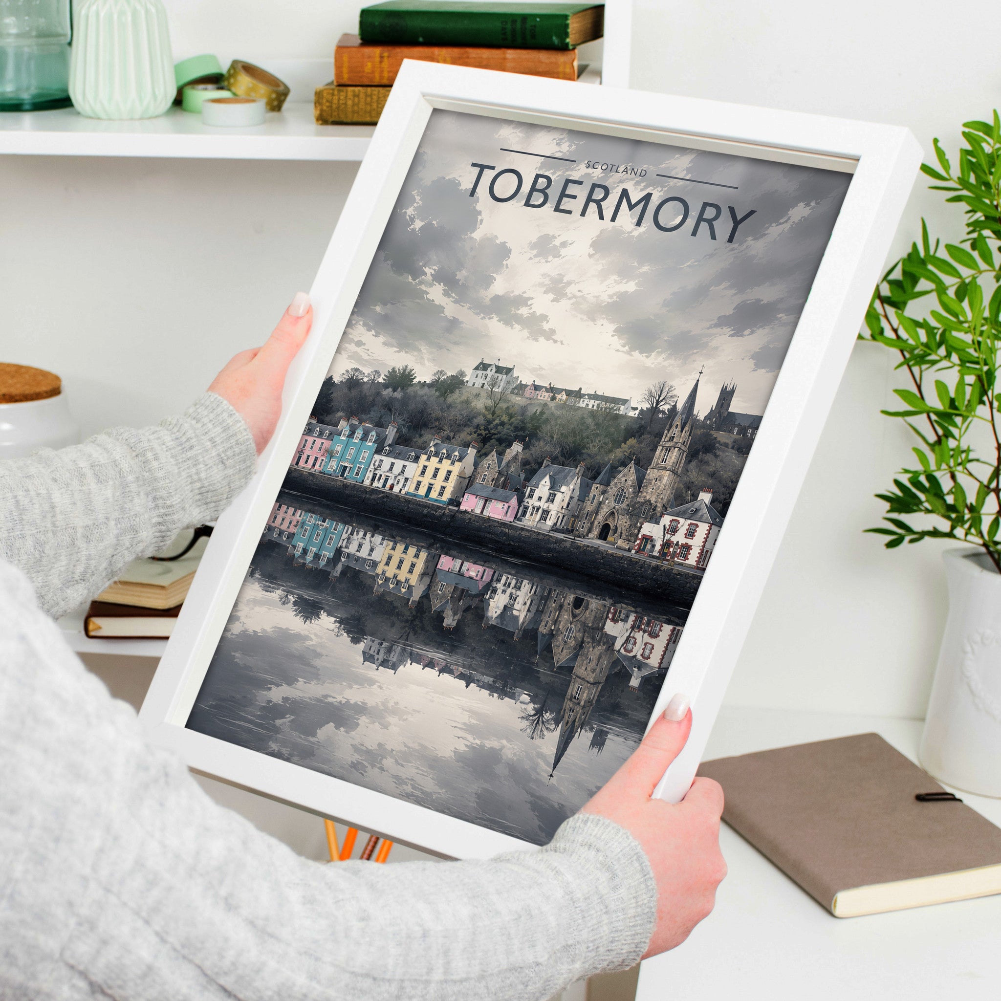 Tobermory Travel Poster in a white frame, held to show scale