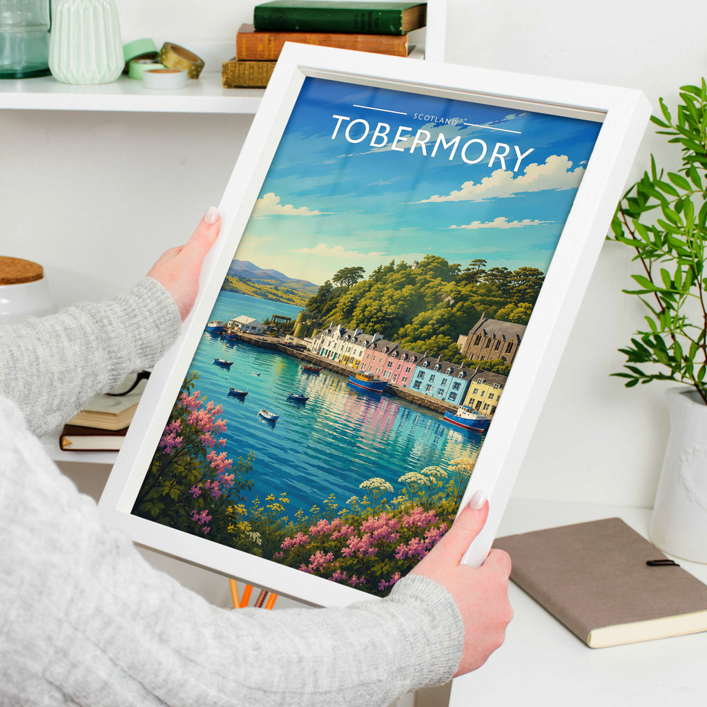 Tobermory #2 Travel Poster in a white frame, held to show scale