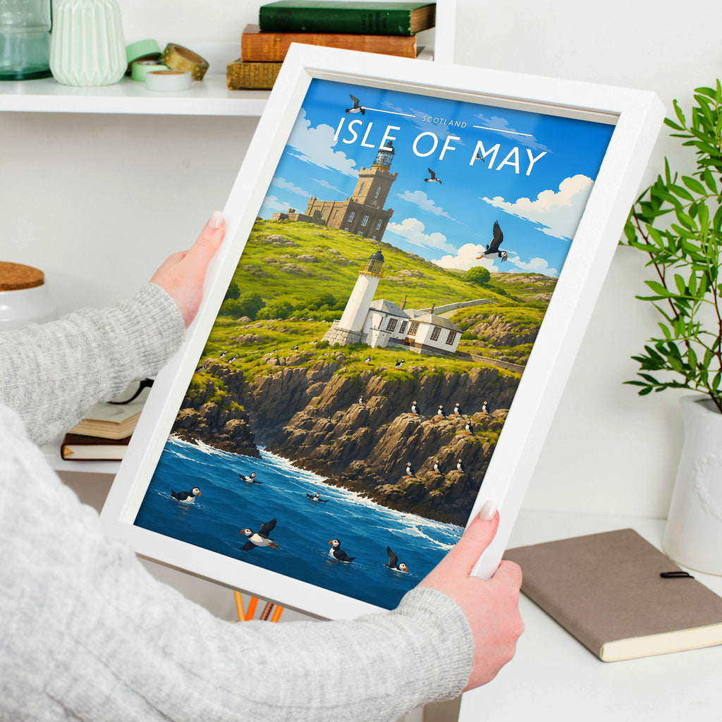 Isle of May Travel Poster in a white frame, held to show scale