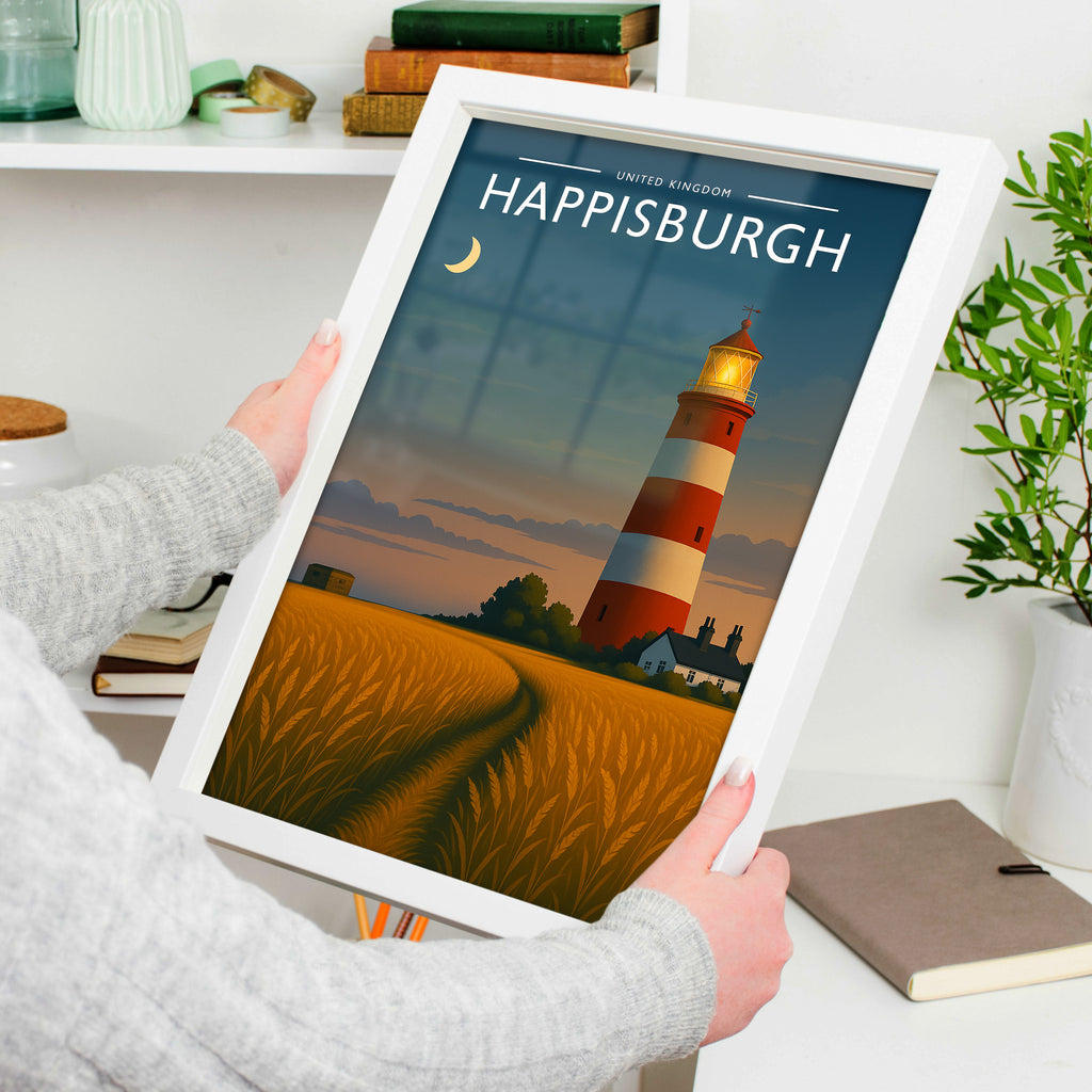 Happisburgh Travel Poster in a white frame, held to show scale