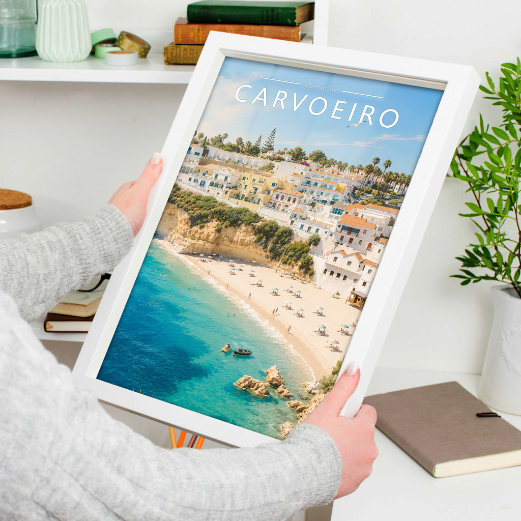 Carvoeiro Travel Poster in a white frame, held to show scale
