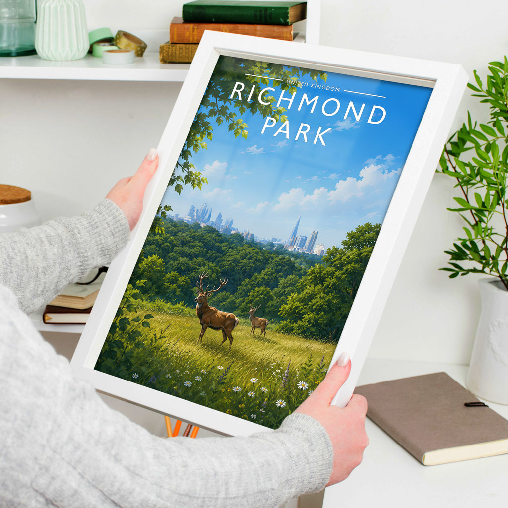 Richmond Park Travel Poster in a white frame, held to show scale