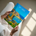 St Ives Travel Poster - A4 print held in hand