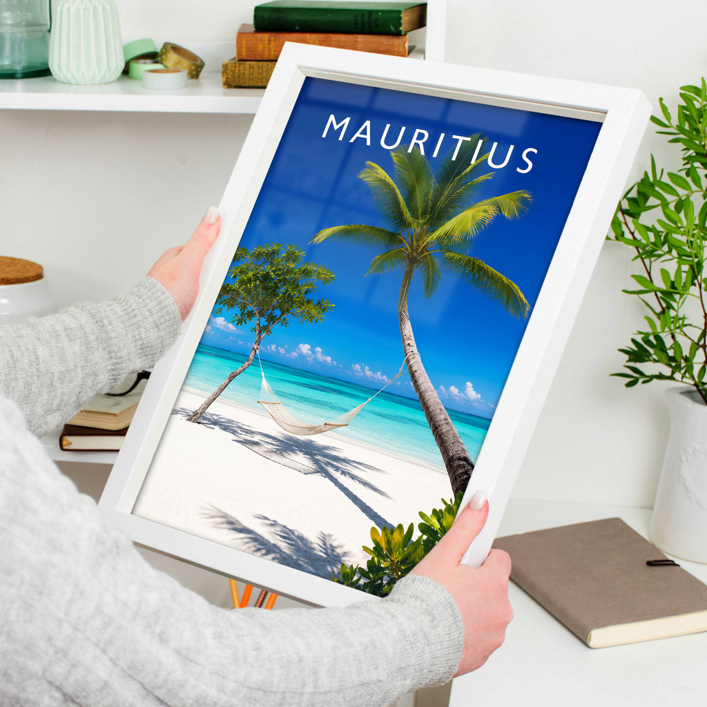 Mauritius Travel Poster in a white frame, held to show scale