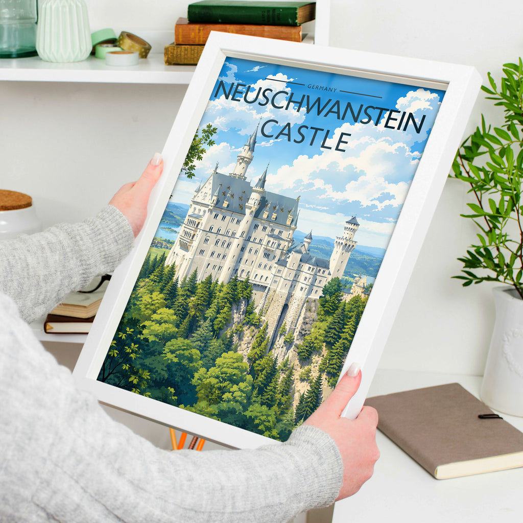 Neuschwanstein Castle Travel Poster in a white frame, held to show scale