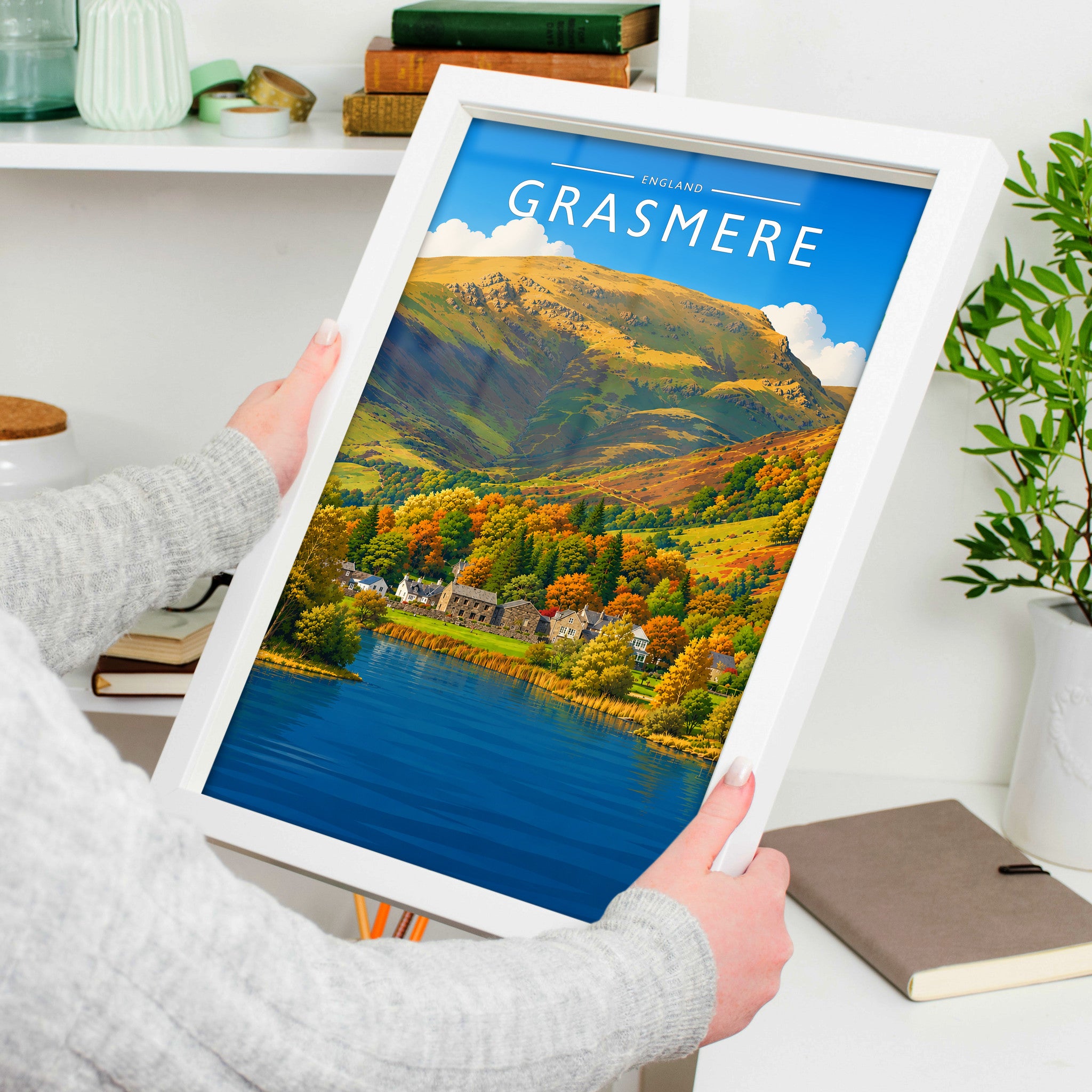 Grasmere #2 Travel Poster in a white frame, held to show scale