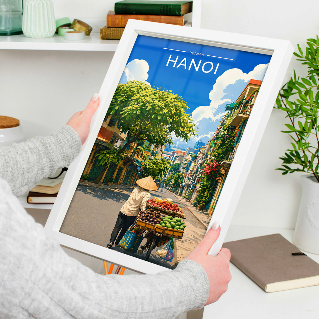 Hanoi #3 Travel Poster in a white frame, held to show scale