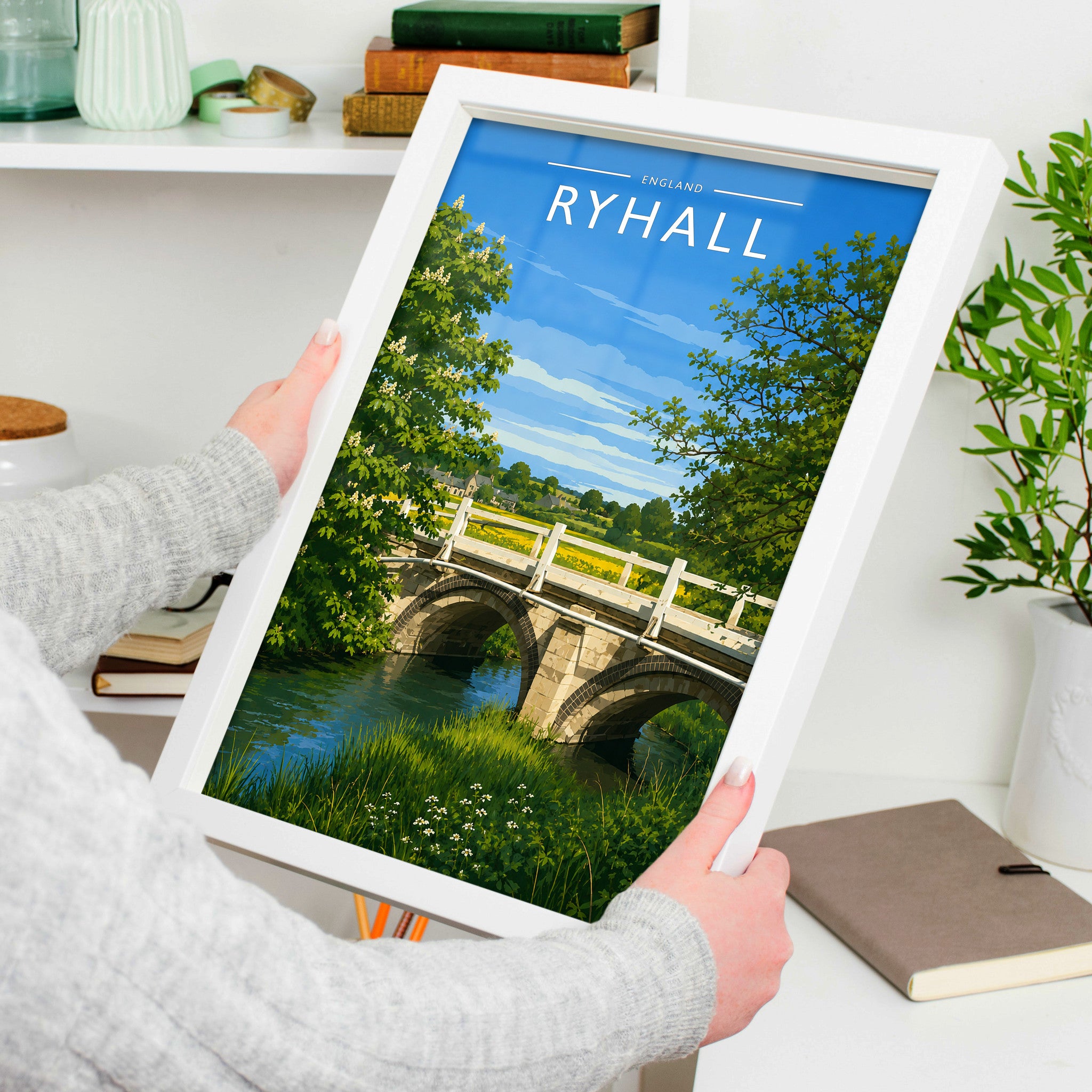 Ryhall Travel Poster in a white frame, held to show scale