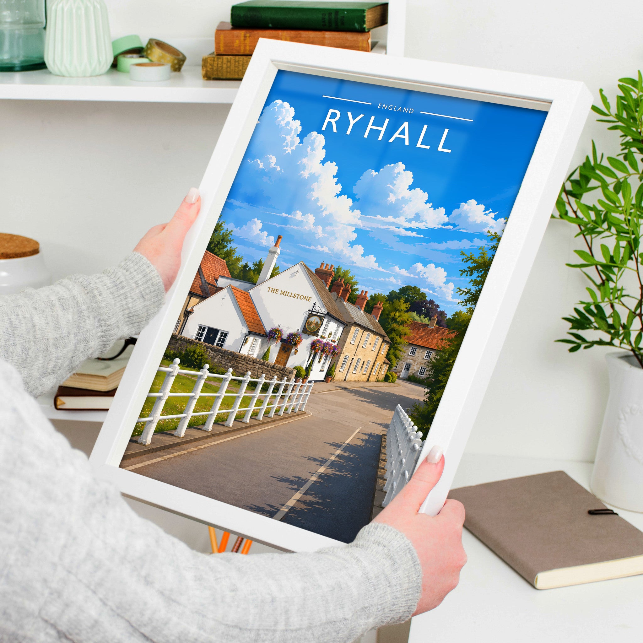 Ryhall #2 Travel Poster in a white frame, held to show scale