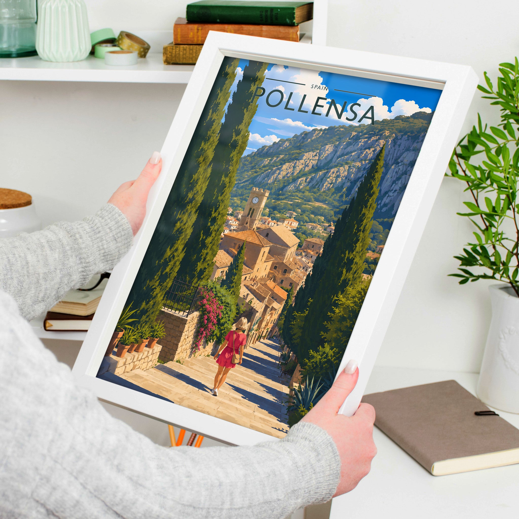 Pollensa #2 Travel Poster in a white frame, held to show scale