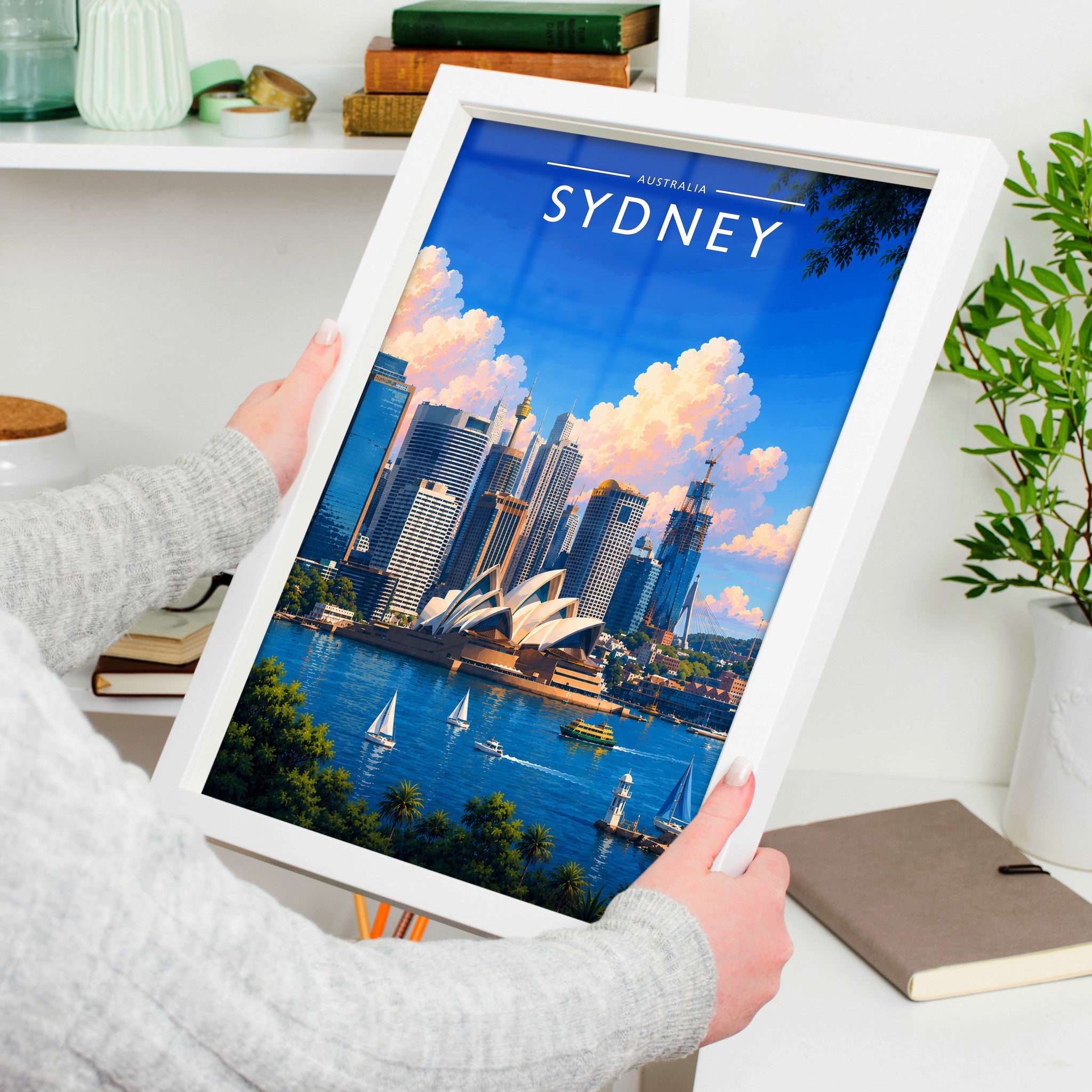 Sydney #2 Travel Poster in a white frame, held to show scale