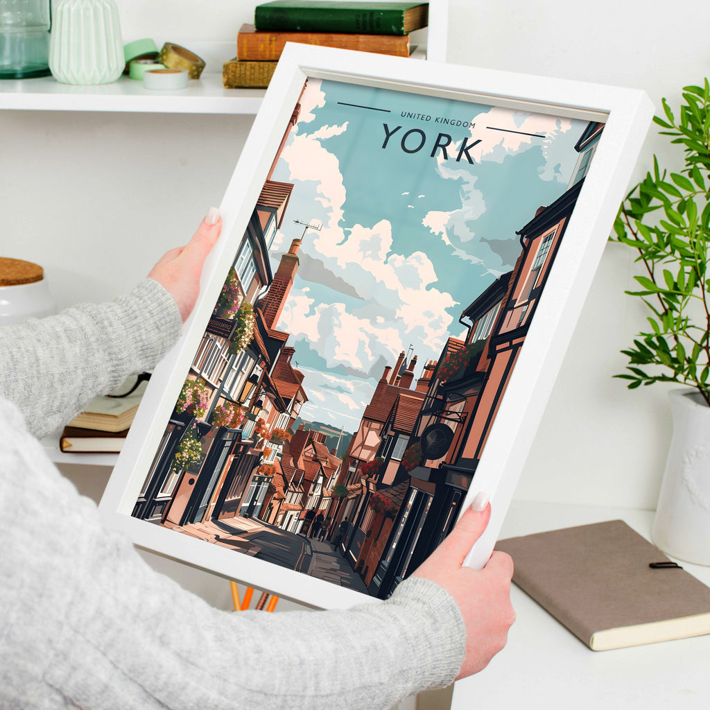 York Travel Poster in a white frame, held to show scale