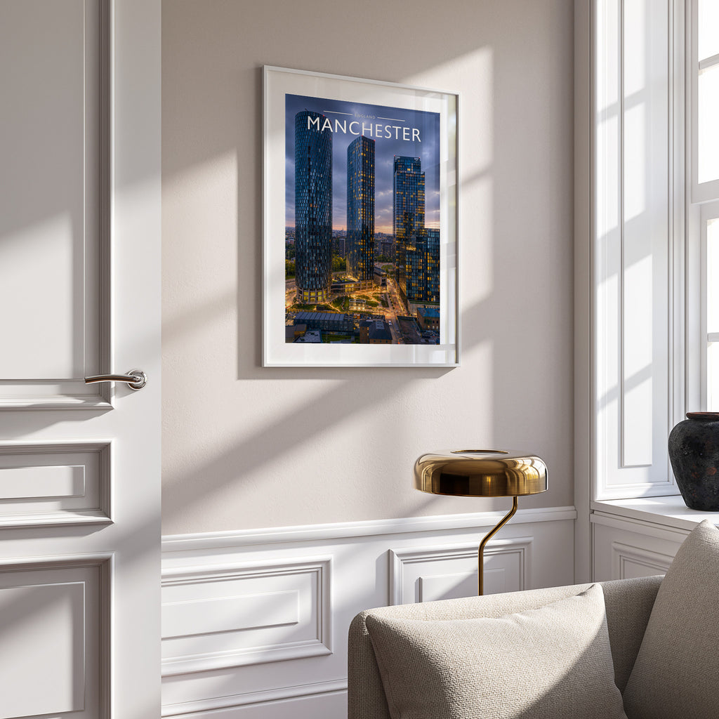 Manchester Travel Poster in a white frame on a panelled wall