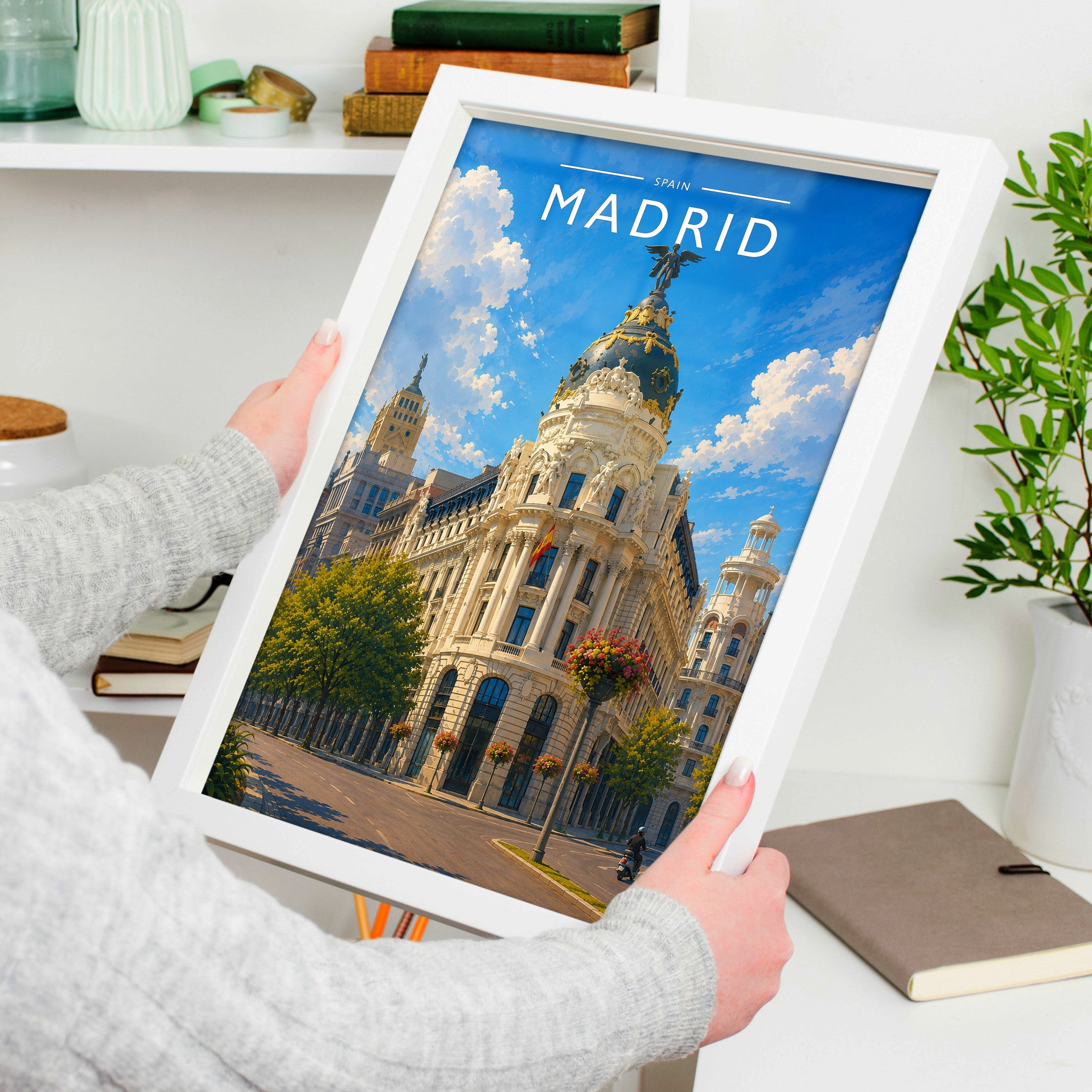 Madrid #2 Travel Poster in a white frame, held to show scale