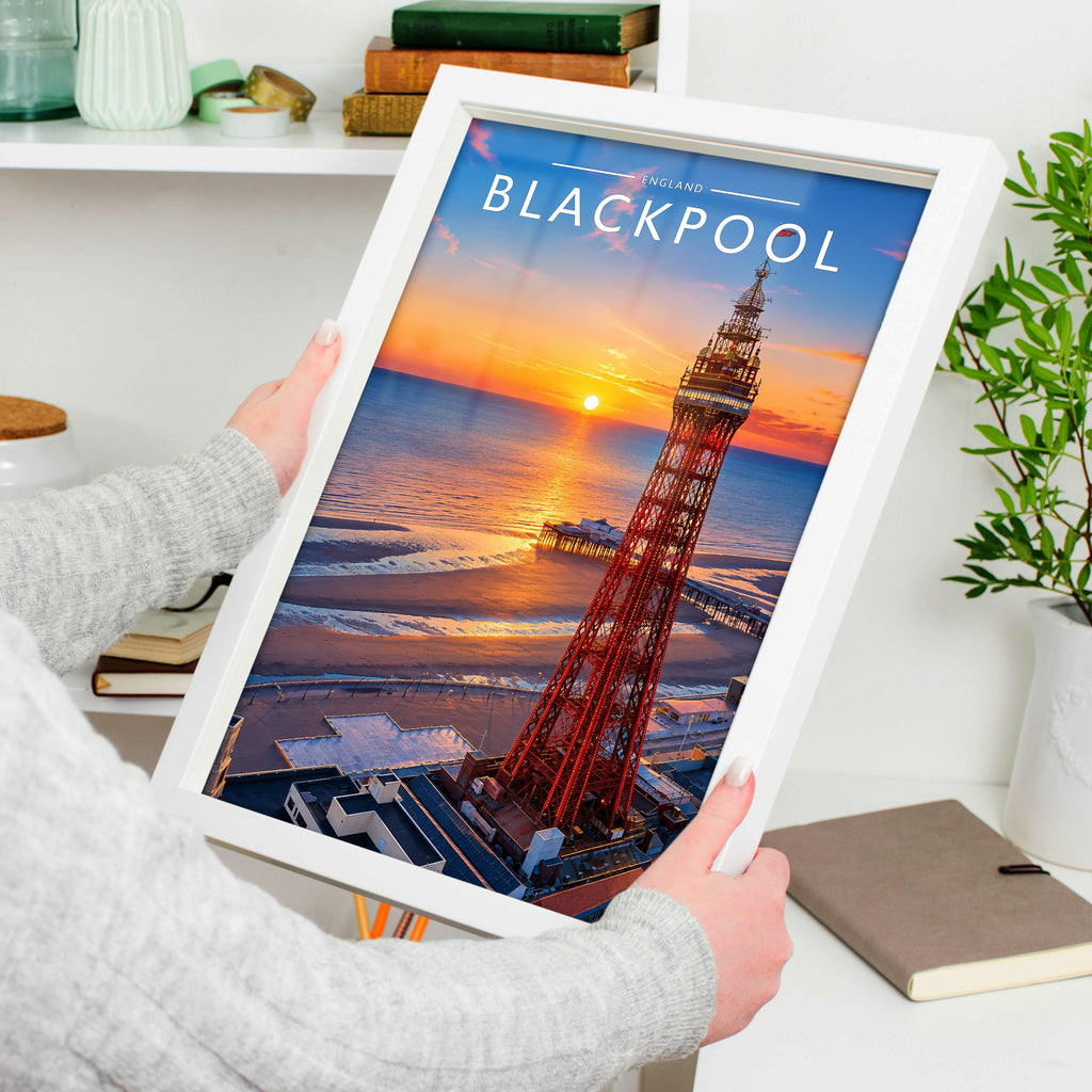 Blackpool Travel Poster in a white frame, held to show scale
