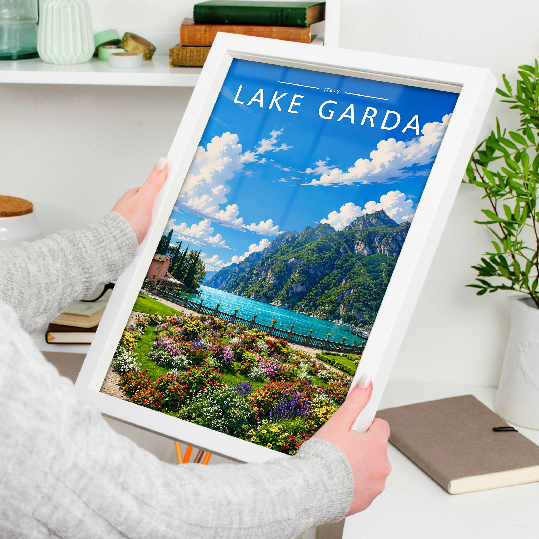 Lake Garda #4 Travel Poster in a white frame, held to show scale