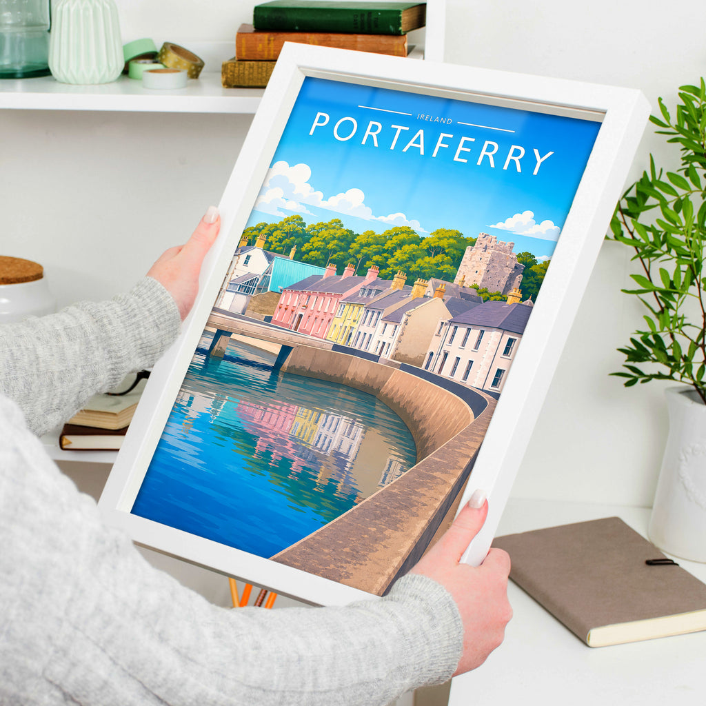 Portaferry #2 Travel Poster in a white frame, held to show scale