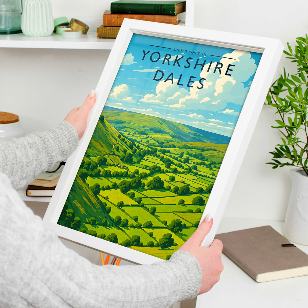Yorkshire Dales Travel Poster in a white frame, held to show scale