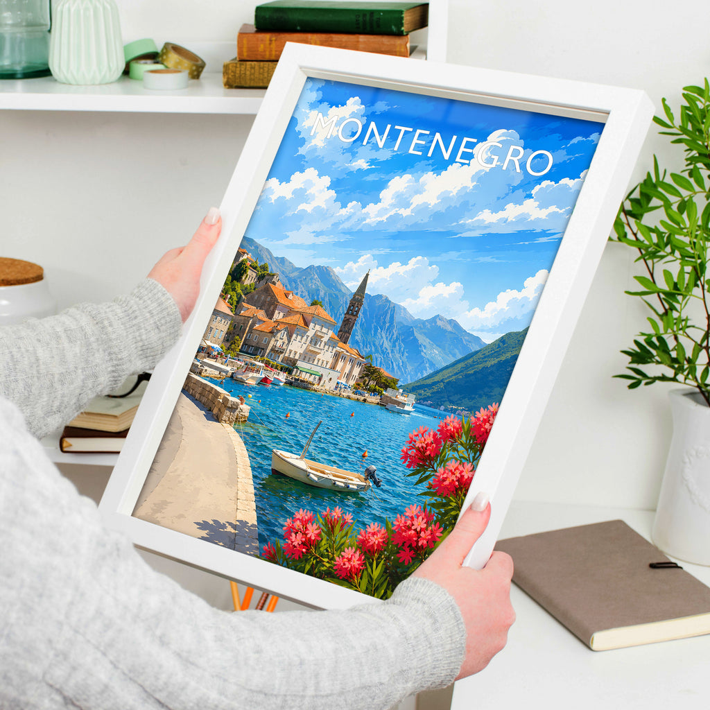Montenegro #2 Travel Poster in a white frame, held to show scale