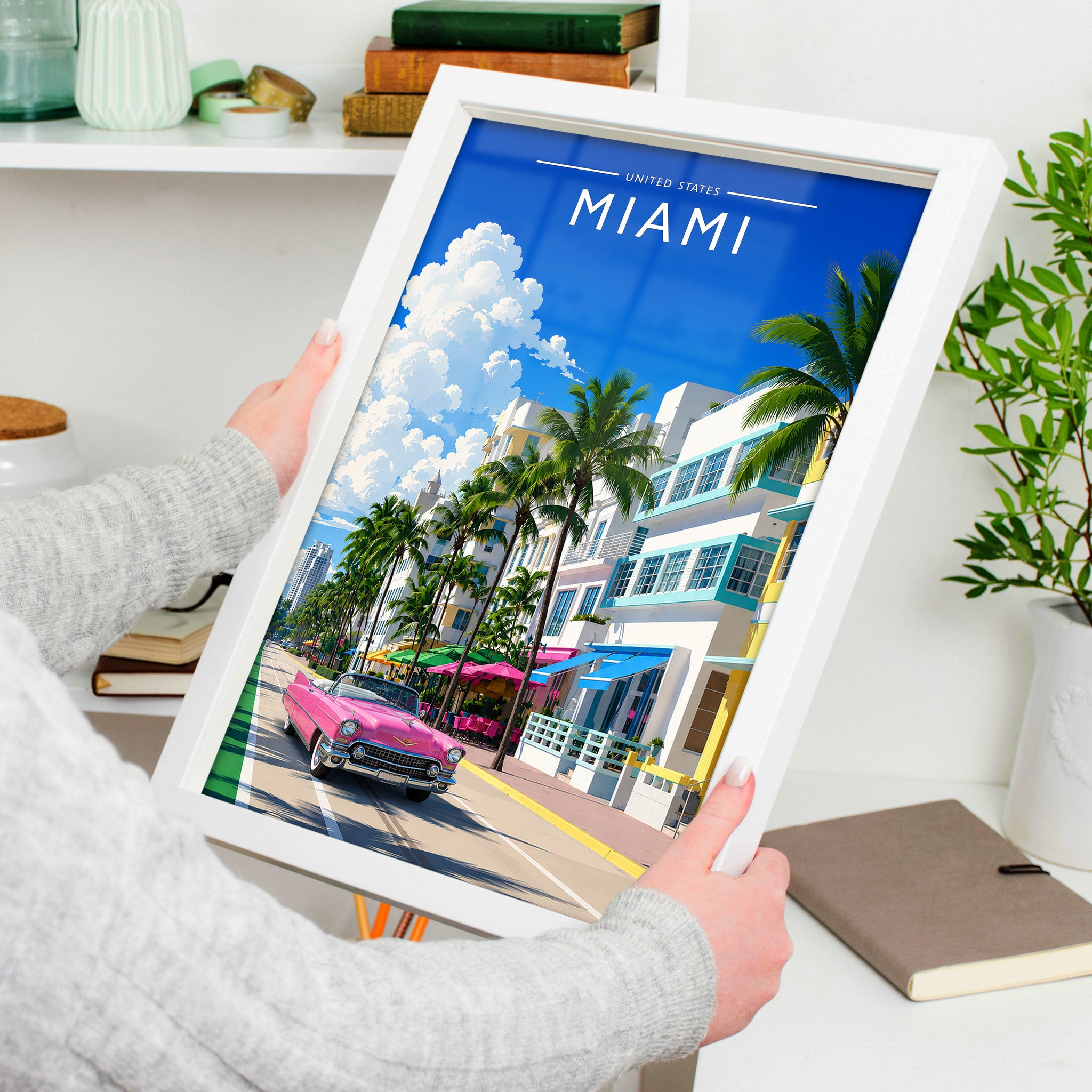 Miami #2 Travel Poster in a white frame, held to show scale