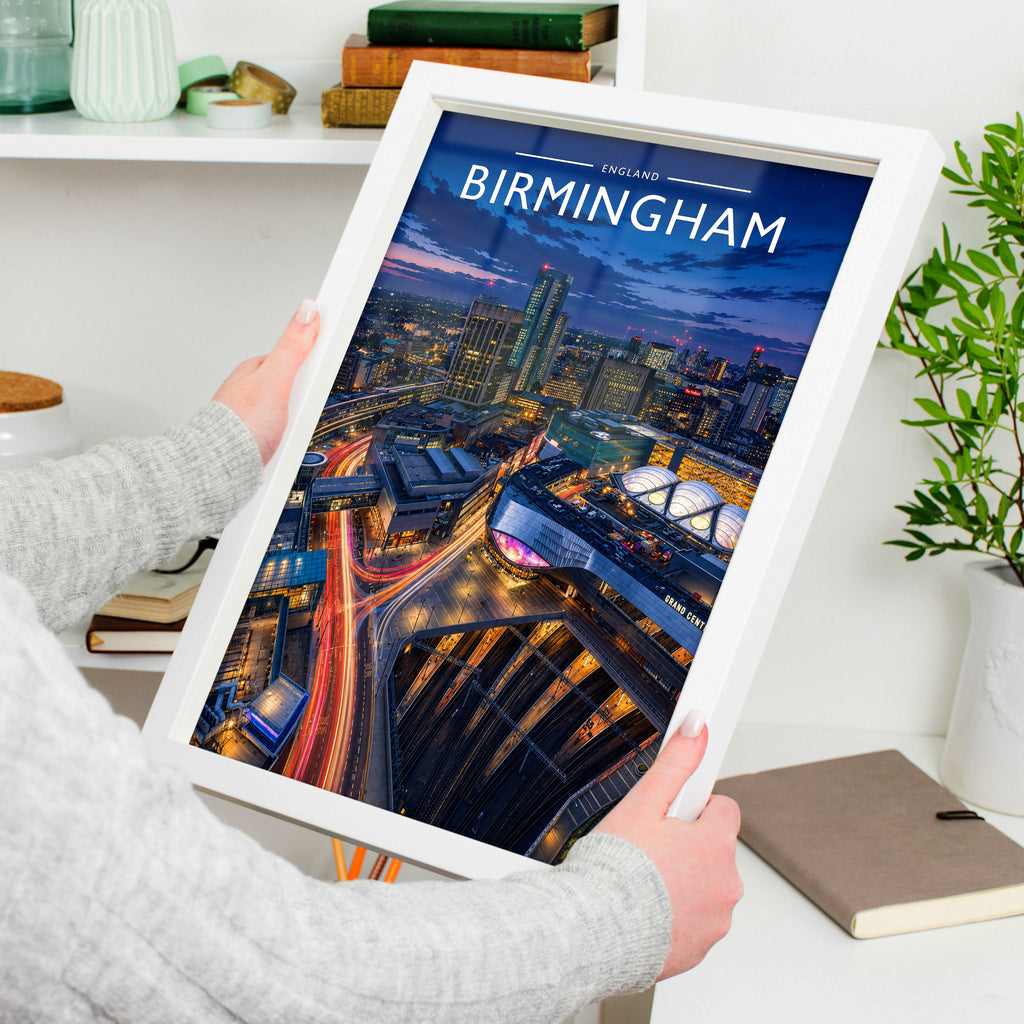 Birmingham #2 Travel Poster in a white frame, held to show scale