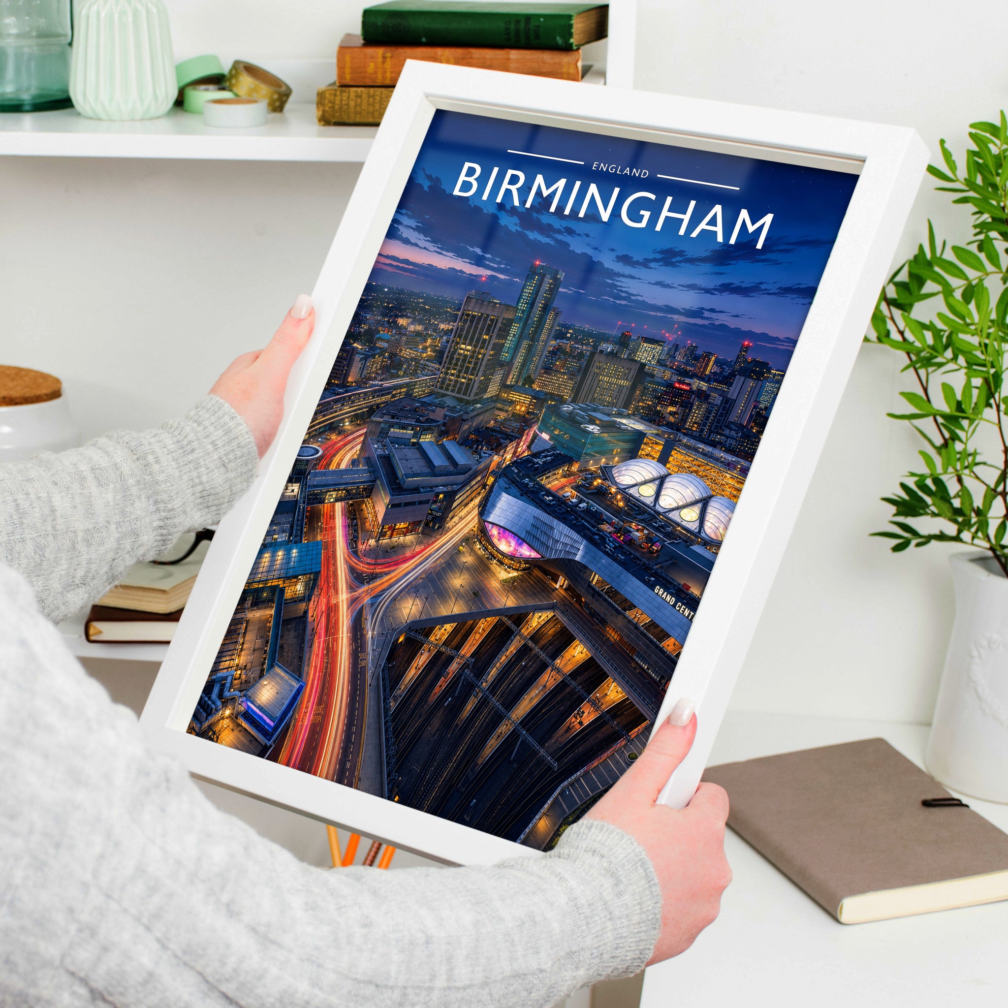 Birmingham #2 Travel Poster in a white frame, held to show scale
