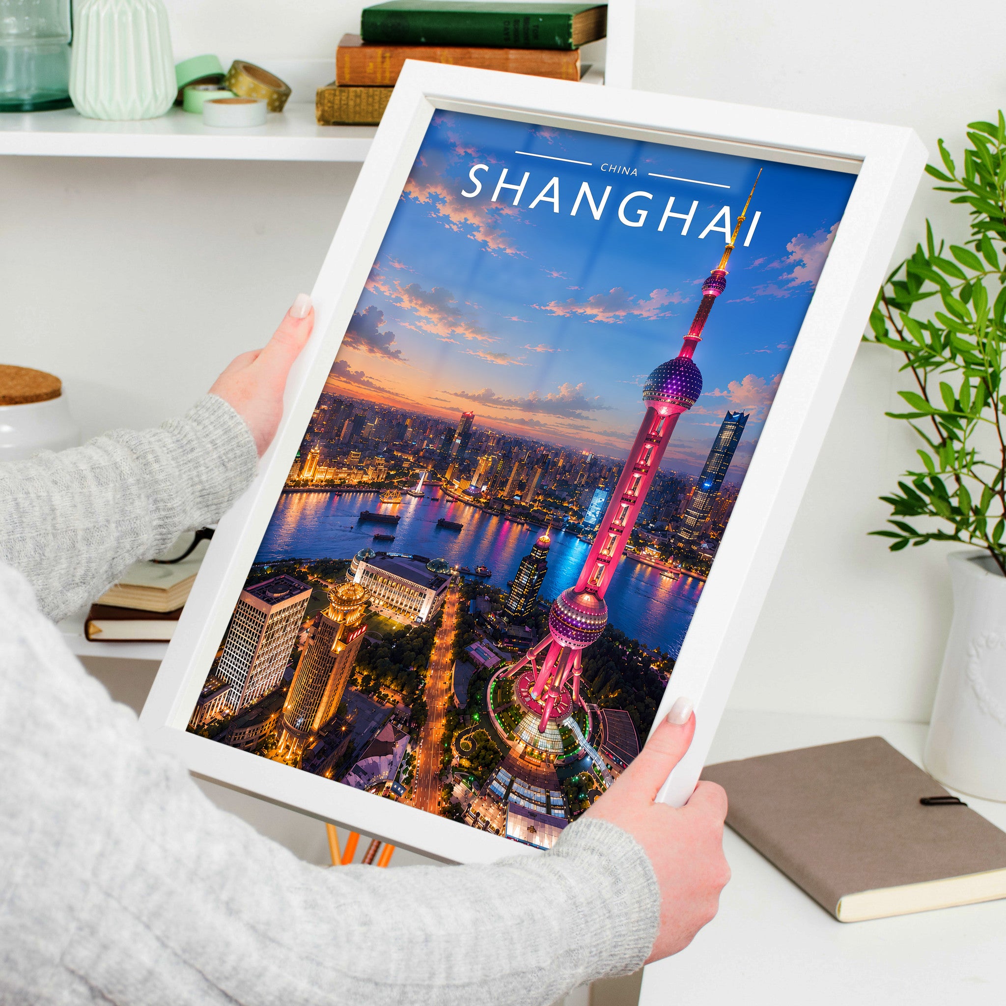 Shanghai #2 Travel Poster in a white frame, held to show scale