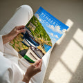 Penberth Cove Travel Poster - A4 print held in hand