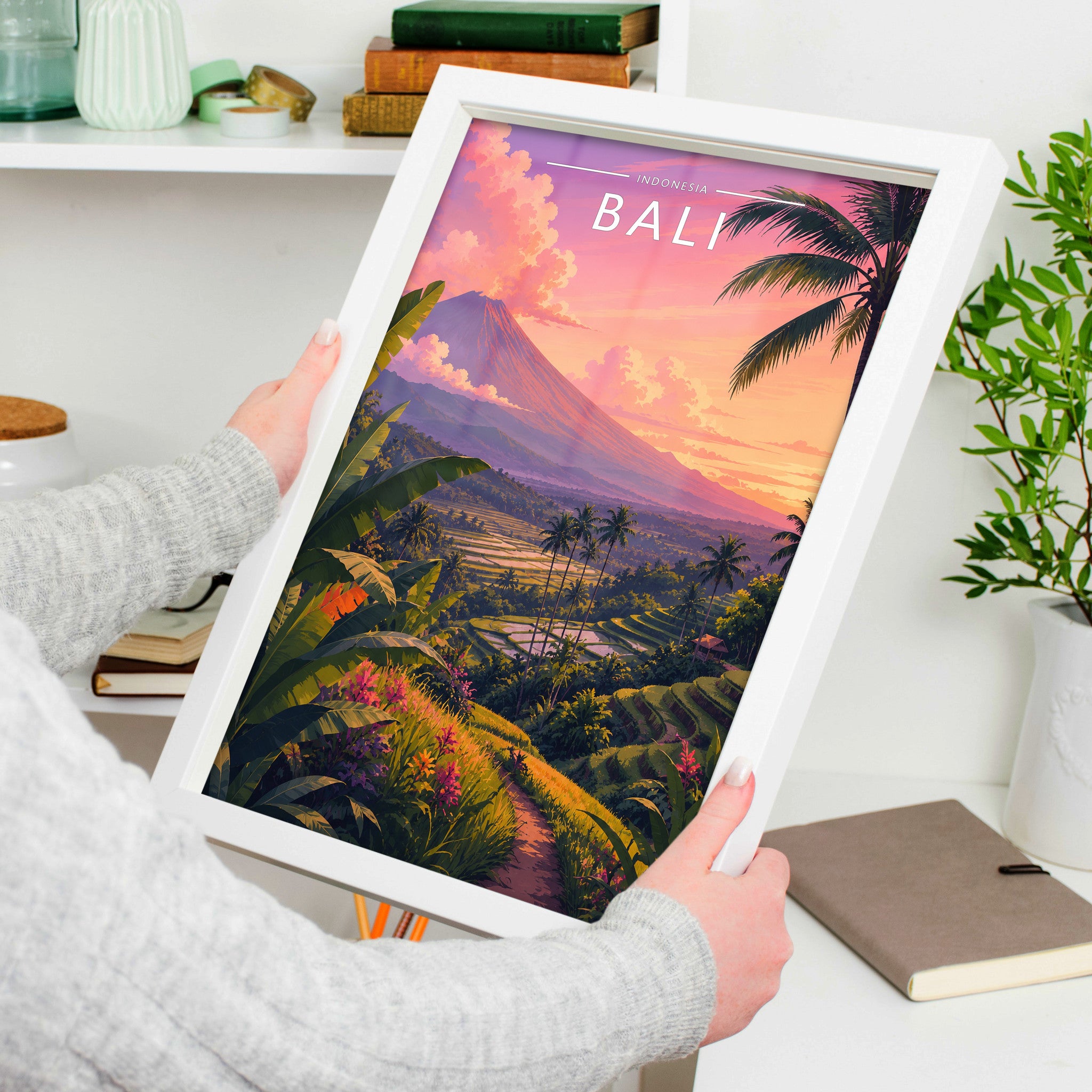 Bali #2 Travel Poster in a white frame, held to show scale