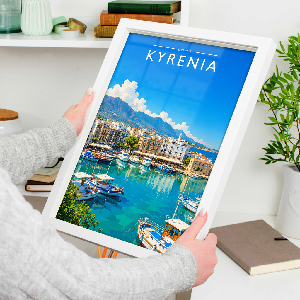 Kyrenia Travel Poster in a white frame, held to show scale