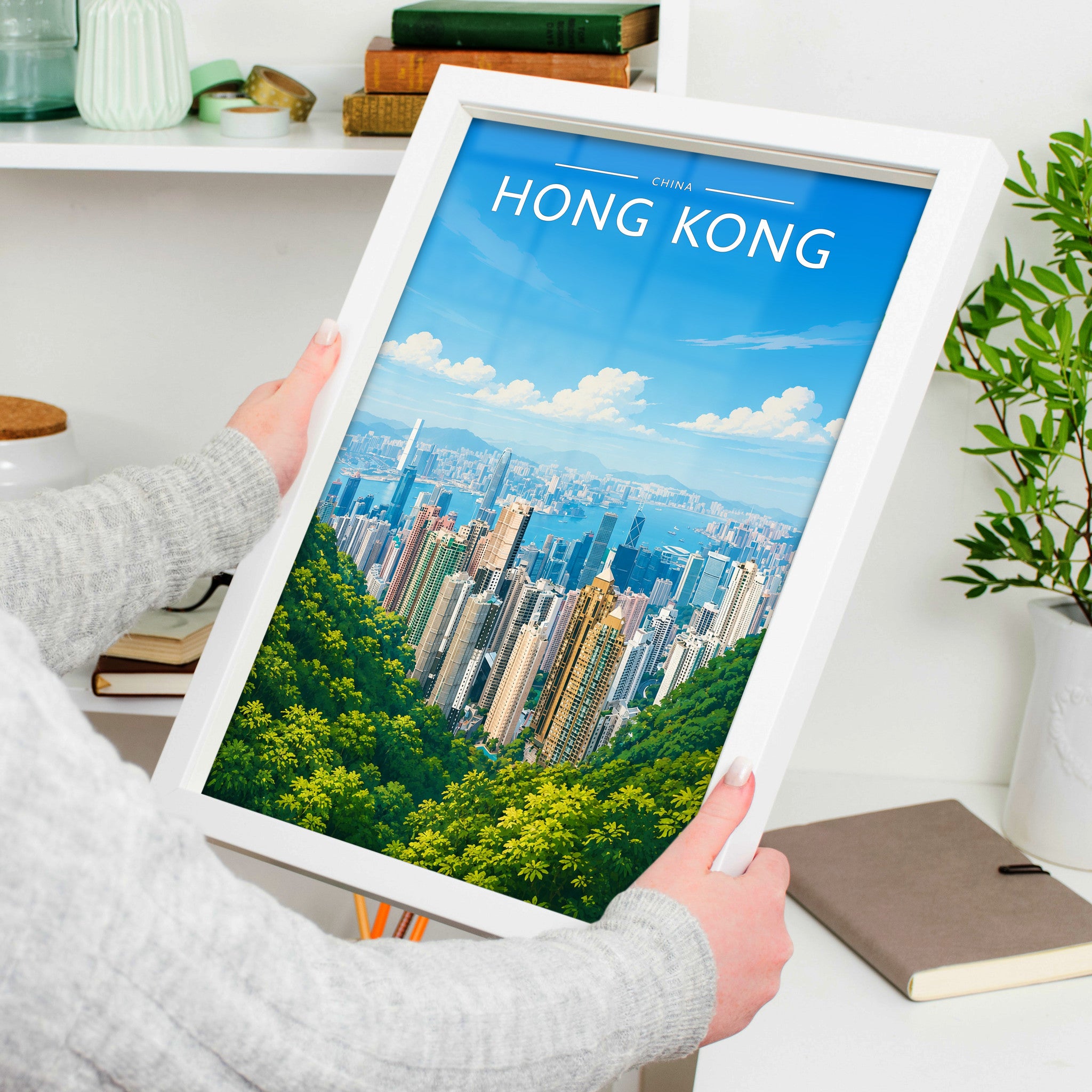 Hong Kong #2 Travel Poster in a white frame, held to show scale