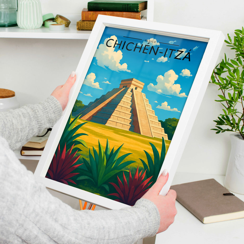 Chichén-Itzá Travel Poster in a white frame, held to show scale