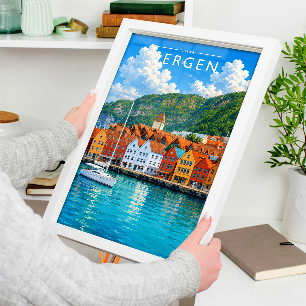 Bergen Travel Poster in a white frame, held to show scale