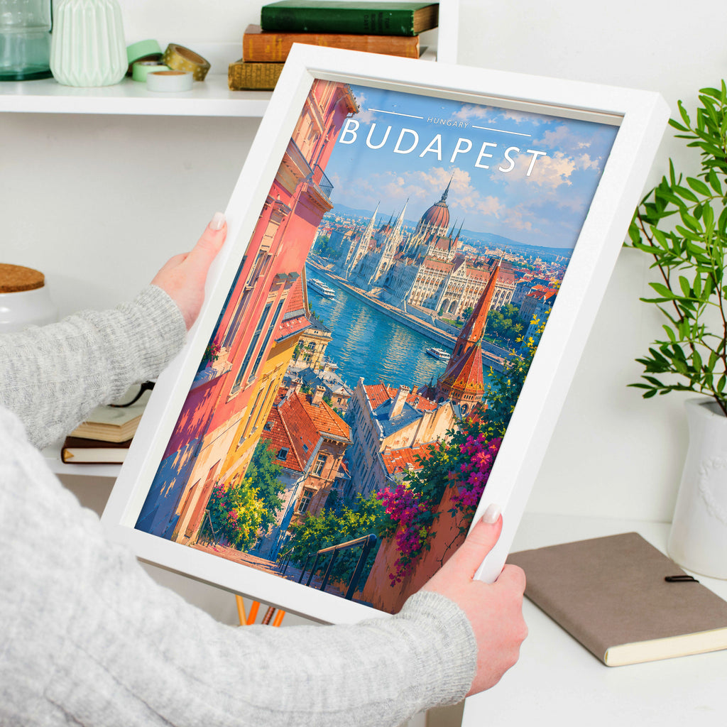 Budapest Travel Poster in a white frame, held to show scale