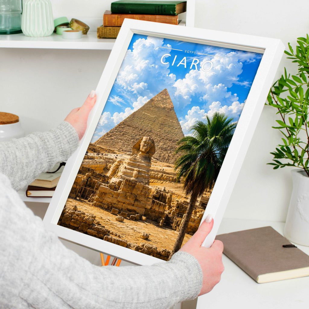 Cairo #2 Travel Poster in a white frame, held to show scale