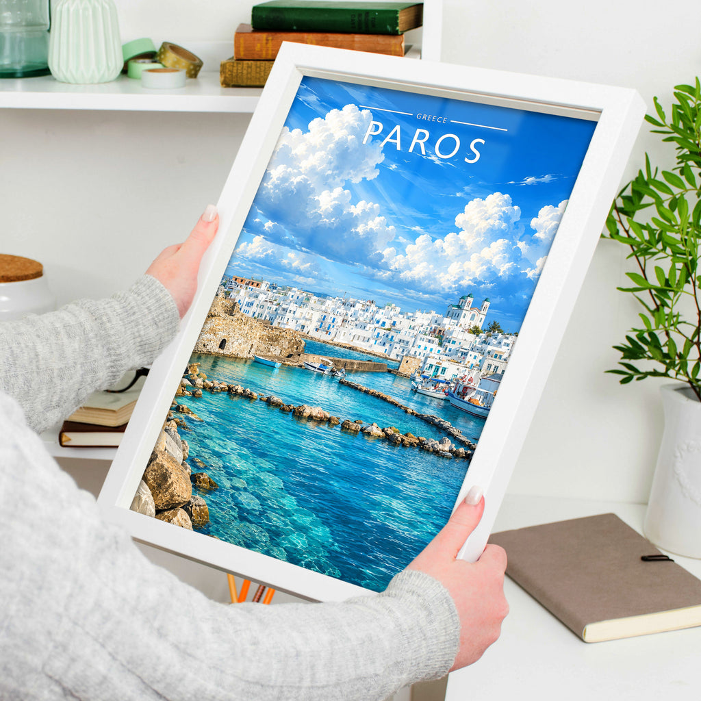 Paros #2 Travel Poster in a white frame, held to show scale